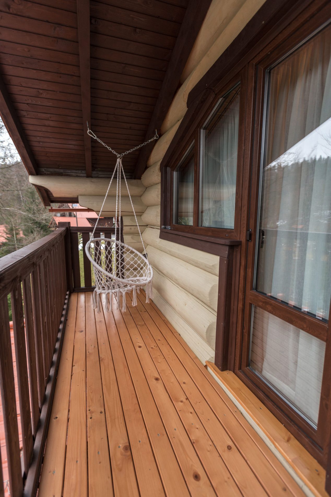 Three-room cottage with a terrace and a balcony